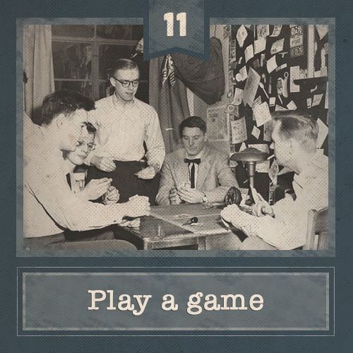 Vintage men sitting around table playing poker. 