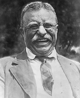 Theodore Roosevelt's laughing portrait showing mustache.