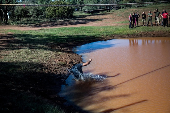 Atomic Athlete Vanguard Brett falling in Mud Pit.