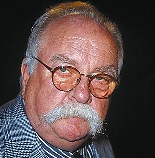 Wilford Brimley's portrait showing mustache.