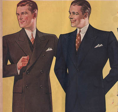 Two men in suits standing next to each other, showcasing the essence of Art of Manliness and the principles taught at Suit School.