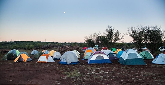 Tents in field atomic athlete Vanguard report review. 