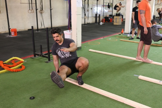 Man doing tripod transition.