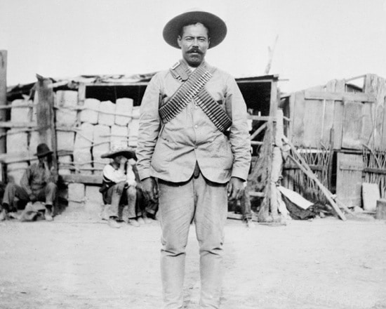 Pancho Villa's portrait showing mustache in field.