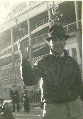 A man wearing a hat, surrounded by the right kind of people.